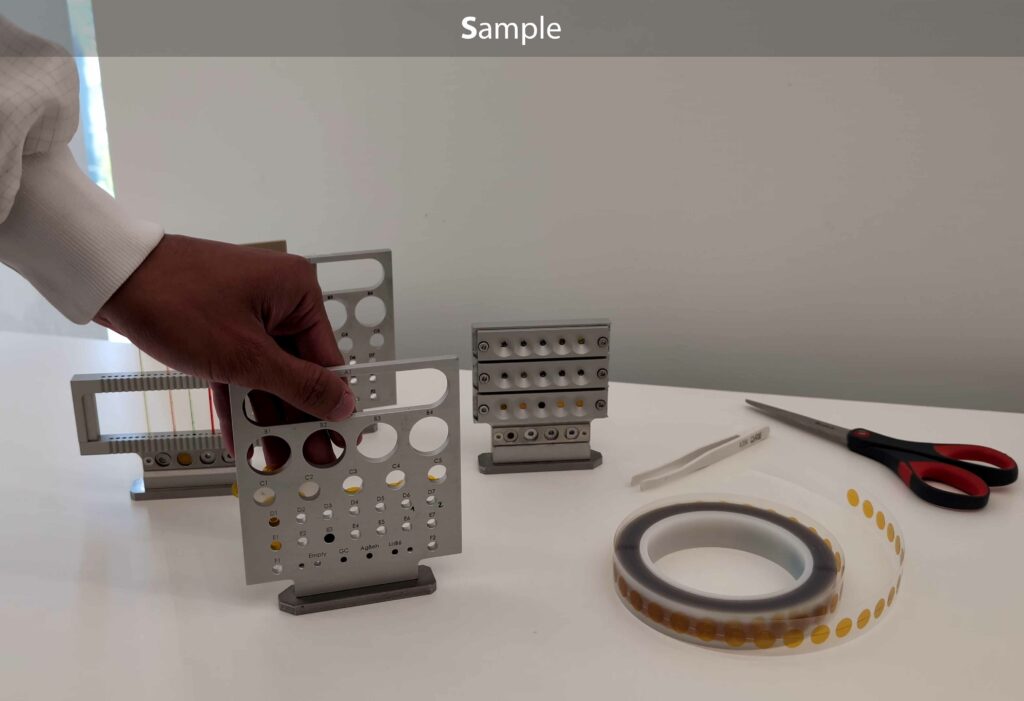 Table showcasing SAXS sample holders, illustrating the first step of the SMART workflow in XSACT Pro data analysis software.